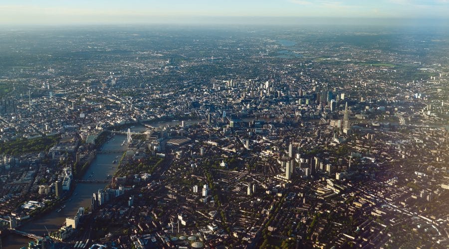 An aerial shot of the cityscape of London at daytime